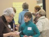 Members use their 5 sticky dots to vote for their program planning priorities.